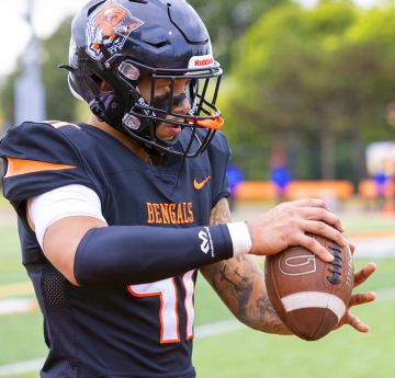 Player holding a football